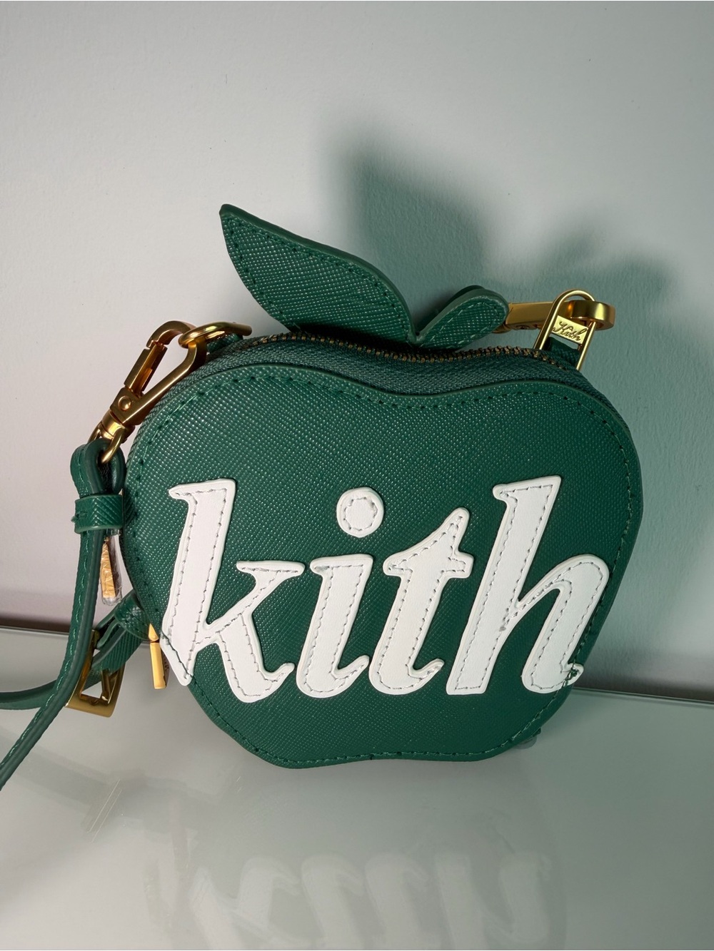 Kith Dark Green Apple Crossbody Bag with White Logo